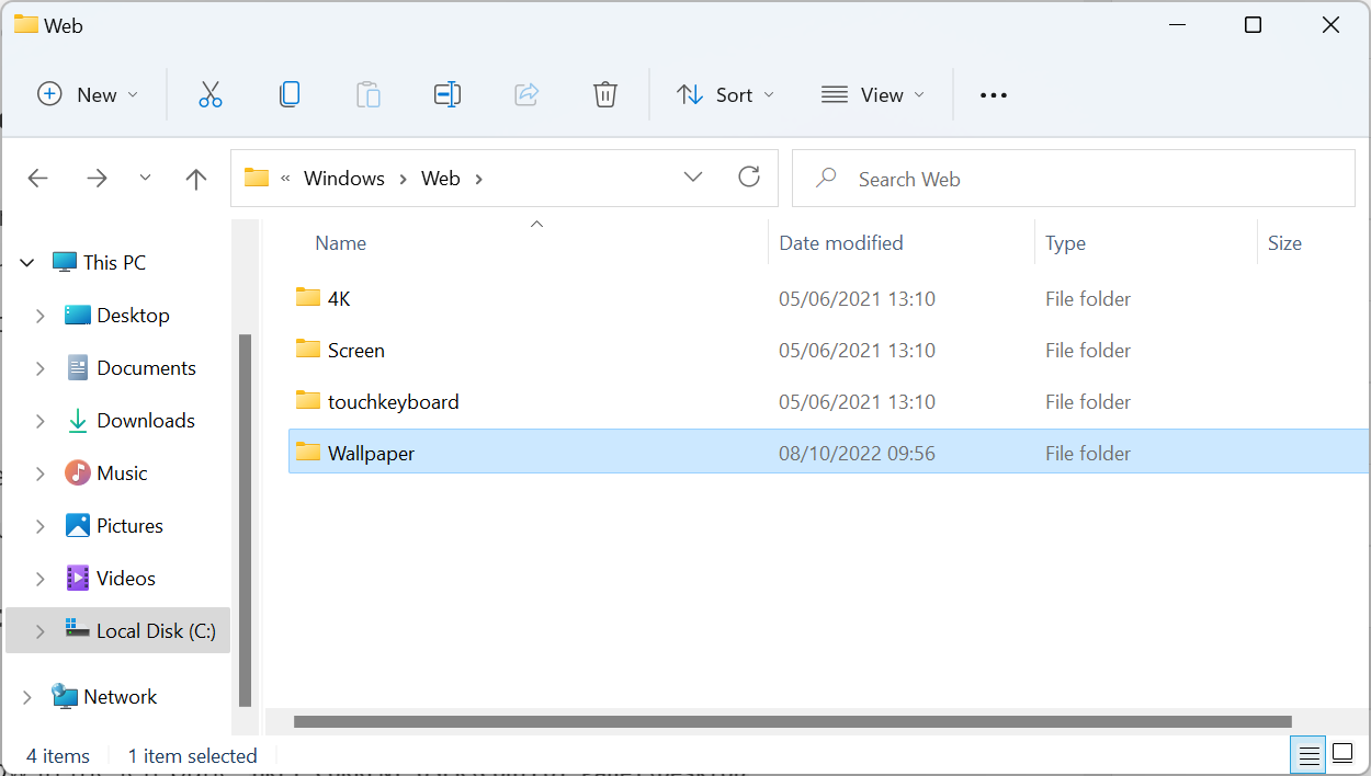 主题背景位于 Windows 11 中的什么位置?